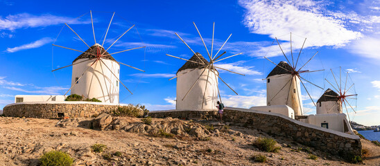 Greece travel, windmills of Mykonos island. Chora town, popular touristic attraction. Cyclades - obrazy, fototapety, plakaty