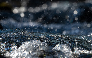 close-up of turbulent waters of a small mountain stream 