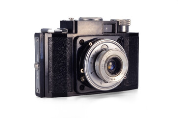 Old film camera isolated on white background.