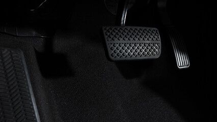 Accelerate and Brake. Foot pressing foot pedal of a car to drive ahead. Accelerator and brake pedal...