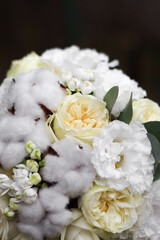 Wedding bouquet of white cotton flowers. Wedding day