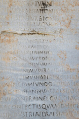 Ancient Greek inscriptions on stone in Ephesus archeological site in Turkey - writings, design, background, texture, creative use