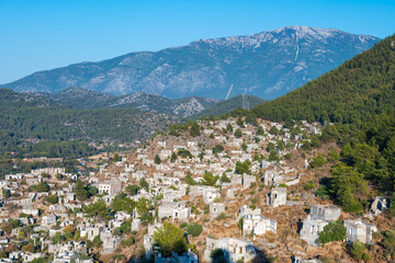 Fototapeta na wymiar Kayakoy village, abandoned Greek village in Fethiye, Turkey. Kayakoy is a ghost town due to the population exchange, the largest in Asia Minor