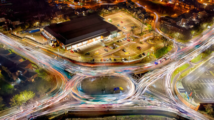 Looking down at the light trails on a roundabout in Colchester, Essex, UK