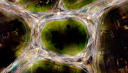 Looking down at the light trails on a roundabout in Colchester, Essex, UK
