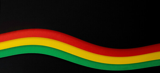 Abstract geometric black, red, yellow, green color background. Black History Month color background with copy space for text