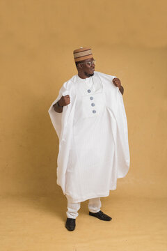 A Traditionally Dressed Northern Business Man Making an Entrance
