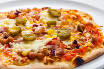 still life of homemade spicy pizza