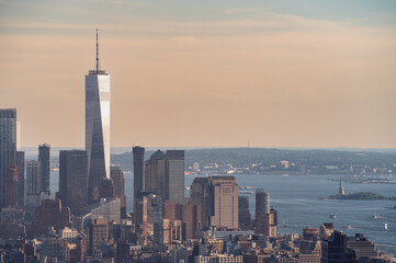 Obraz premium Financial district of nyc with One World Trade Center at sunset - NYC, USA