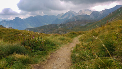 Hiking trail with view over sharp mountain peaks