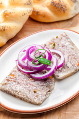 salty jelly called sulc with red and spring onion