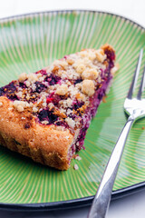 a piece of blueberry cake