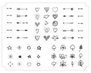 Obraz premium Set of hand-drawn black handle elements. Decorative design elements. Arrows, hearts, stars, lights, leaves. Vector.