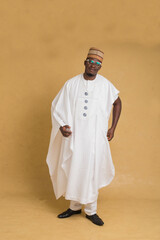 A Traditionally Dressed Northern Business Man Posturing