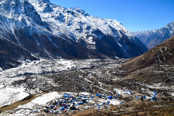 The small village Kyanjin Gumpa from above. Himalaya mountains in Nepal. Tamang Heritage Trail and Langtang trek day 8 to Kyanjin Ri