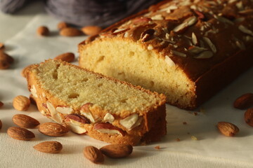 Ghee cake slice. Vanilla flavoured ghee cake with almonds on top. The perfect accompaniment for a cup of coffee.