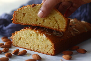Ghee cake slice. Vanilla flavoured ghee cake with almonds on top. The perfect accompaniment for a...