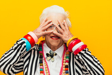 Funny grandmother portraits. Senior old woman dressing elegant for a special event. granny fashion...