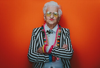 Funny grandmother portraits. Senior old woman dressing elegant for a special event. granny fashion...