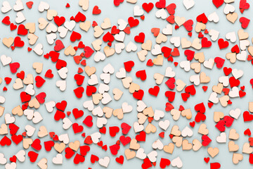 Happy Valentines day background. With small hearts on pastel background.