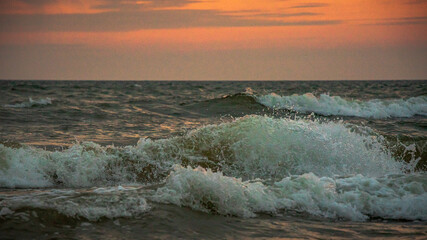 waves in the sea with white foam