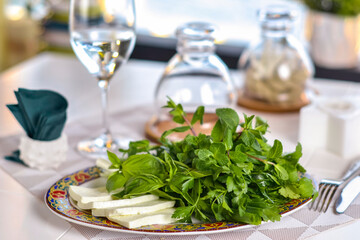 Georgian cuisine dishes: cheese and cilantro.