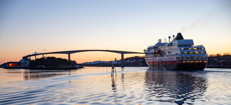 The coastal route ship Ms Finnmarken sails into the sunset - Br&oslash;nn&oslash;ysund,Helgeland,Northern Norway,scandinavia,Europe