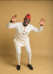 Yoruba Culturally Dressed Business Man Respectfully Surrender