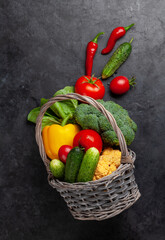 Basket with fresh garden vegetables