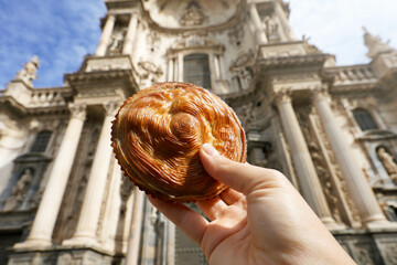 Pastel de carne murciano (Murcian meatloaf) with Cathedral of Murcia, Spain