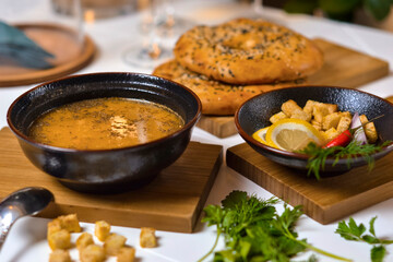 Dishes of Eastern cuisine: soup and pide.