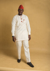 Yoruba Culturally Dressed Business Man leaning backwards in shock