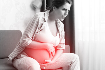 Pregnant woman at home feels sick