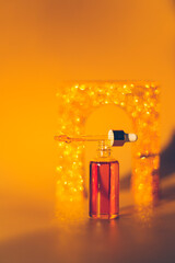 close up of bottle with cosmetic liquid 