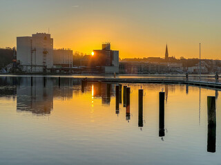 Fototapeta na wymiar pier at sunrise in the port of Flensburg, Schleswig Holstein, Northern Germany