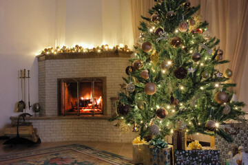 new year cozy home interior with fireplace and christmas tree, garlands. Christmas tree and a garland with glowing lights, a wood burning fireplace with an open fire