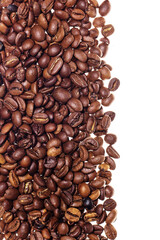Pile of roasted coffee beans on white background