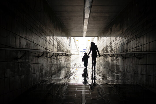 Mom and boy in tunnel