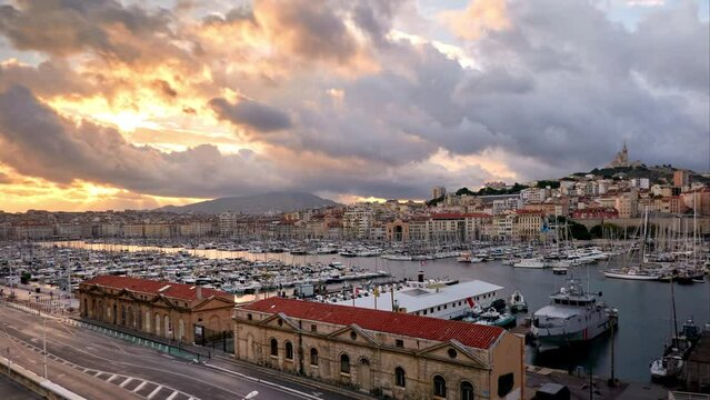 timelapse of cloudscape over Old Port of Marseille and Notre Dame de la Garde, Marseille, France