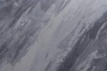 Designer plaster in gray white and dark gradient shades. Imitation of marble