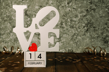 valentine's day. the word love on an abstract background.