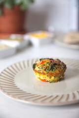 Egg frittata muffin on a plate