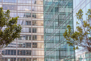 Plakat Glass windows of facade modern building in Lisbon city, Portugal