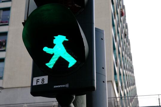 Green Ampelmann traffic signal, typical of the East Germany