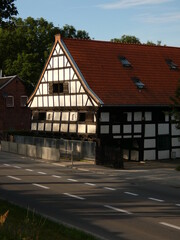 Old arcaded house called Lions’ Manor situated at a busy street, Trakt św. Wojciecha, Gdańsk, Poland