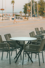 Empty chairs and tables in cafe during Covid-19 pandemics, town of Crikvenica in Croatia