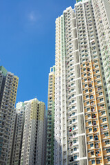 Fototapeta na wymiar White Tall Buildings In Hong Kong Kowloon City 4