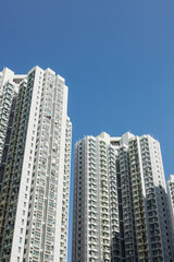 Fototapeta na wymiar White Tall Buildings In Hong Kong Kowloon City 5