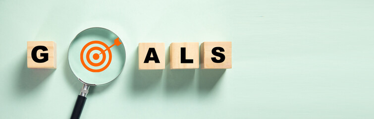 Goal wording with magnifying glass.