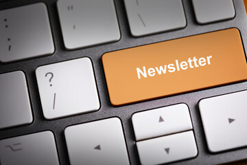 A keyboard with a button - Newsletter